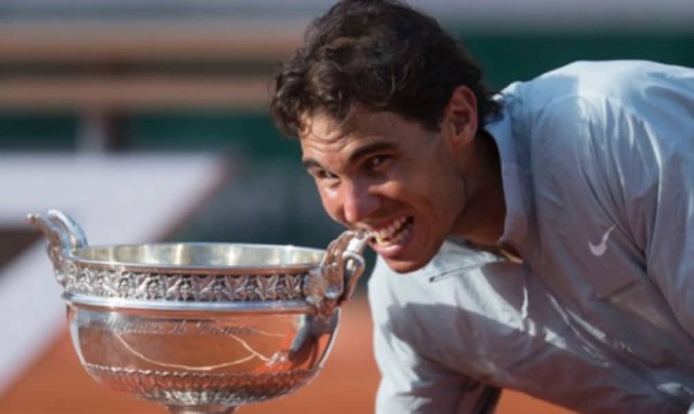 Rafael Nadal became the first man in history to lift the same Grand Slam title nine times and the first to win Roland Garros for five successive ye...