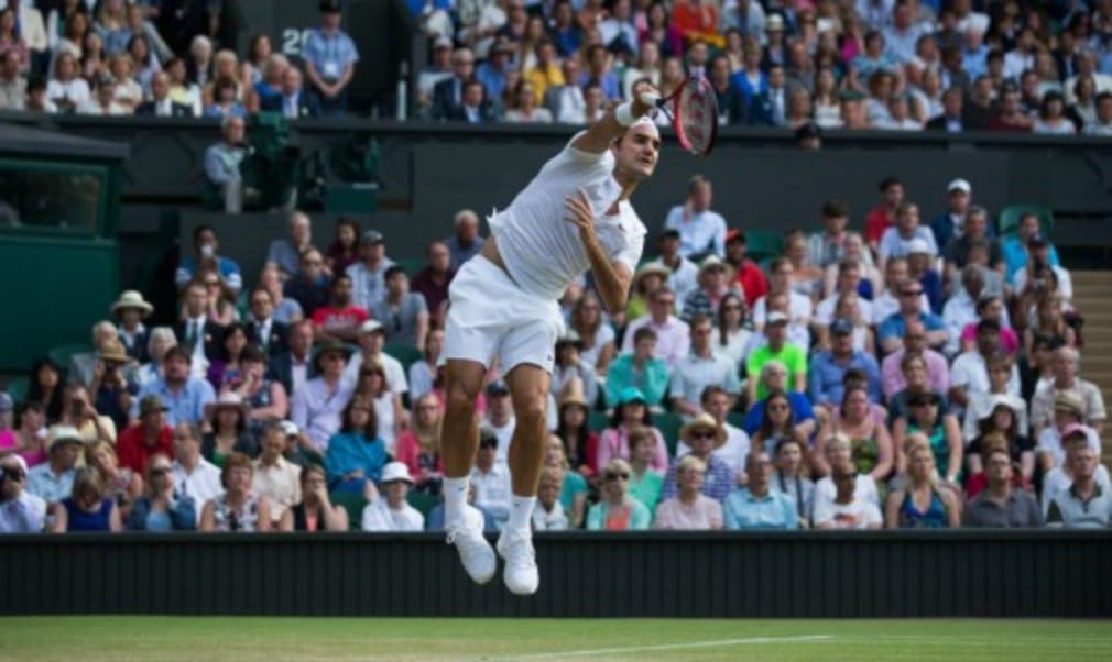 Roger Federer produced one of the finest performances of his career to beat Andy Murray in straight sets to set up a final rematch with defending c...