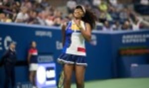 Naomi Osaka grabbed the headlines on a rain-interrupted day two of the US Open as she blasted her way past the defending champion Angelique Kerber ...