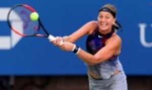 Petra Kvitova was the first woman to book her place in the fourth round of the US Open when she defeated Caroline Garcia for the loss of only four ...
