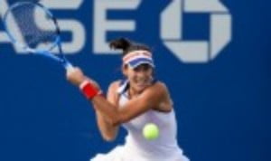 Garbine Muguruza set up a mouth-watering fourth round clash with Petra Kvitova at the US Open after recording an emphatic 6-1 6-1 victory over Magd...