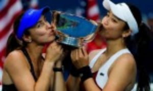 Martina Hingis and Yung-Jan Chan cruised to the US Open womenÈs doubles title with a comprehensive 6-3 6-2 success over Lucie Hradecka and Kateri...
