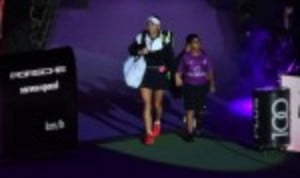 Caroline Wozniacki eased into the semi-finals of the BNP Paribas WTA Finals in Singapore after a thumping 6-0 6-2 win over Simona Halep in the Red ...