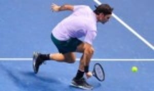 Roger Federer extended his winning run to 13 matches after a hard-fought 6-7(5) 6-4 6-1 win over Marin Cilic in the Boris Becker Group at the Nitto...