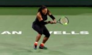 Serena Williams squeezed past Kiki Bertens 7-6(5) 7-5 to set up a mouth-watering third round tie with her sister Venus at the BNP Paribas Open in I...
