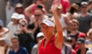 Caroline Wozniacki recovered from a precarious position to defeat Ashleigh Barty 6-2 4-6 6-4 and reach the last sixteen of the Mutua Madrid Open