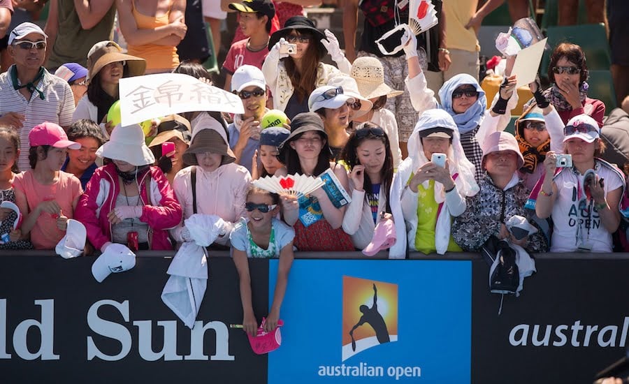 Tennis fans wait for autographs