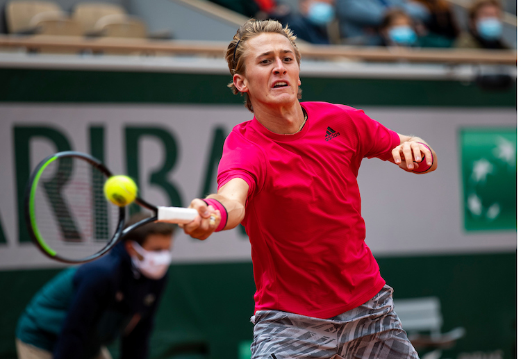 Sebastian Korda stretches for a forehand at Roland Garros 2020