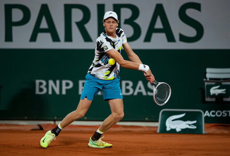 Jannik Sinner drives a backhand at Roland Garros 2020