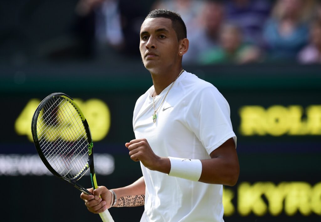 Nick Kyrgios celebrates during his match against Rafael Nadal at Wimbledon in 2014