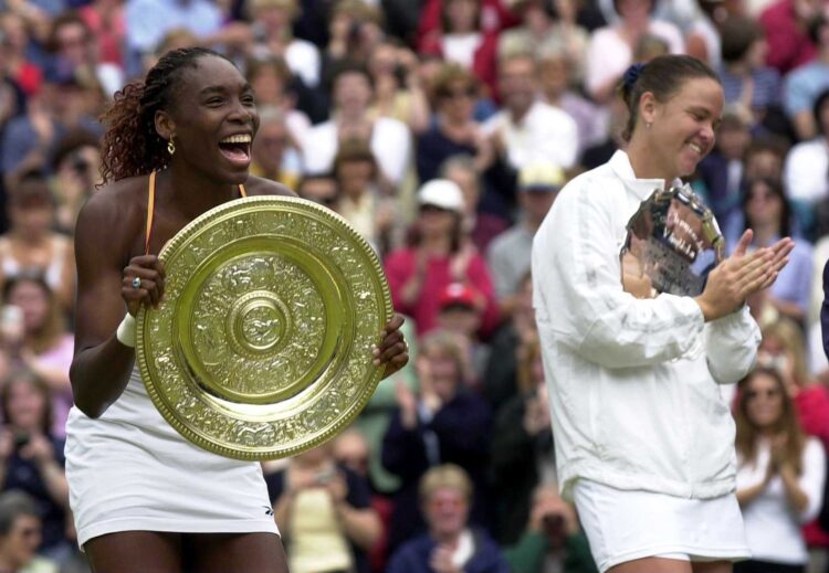 8 Jul 2000: Venus Williams of the USA with the Wimbledon trophy after beating Lindsay Davenport of the USA during the final of the womens singles ...