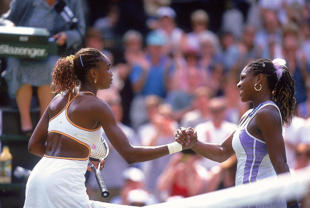 Venus Williams of the USA (left) beats younger sister Serena during the semi final game at the Wimbledon Lawn Tennis Championship at the All England Lawn Tennis and Croquet Club, Wimbledon, London.
