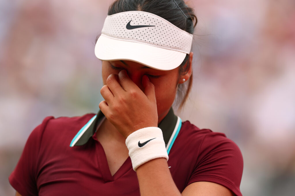 Emma Raducanu covers her face