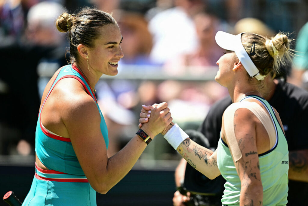 Aryna Sabalenka and Marketa Vondrousova shake hands