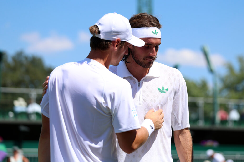 Stefanos Tsitsipas of Greece retires against Valentin Royer, they embrace at the net