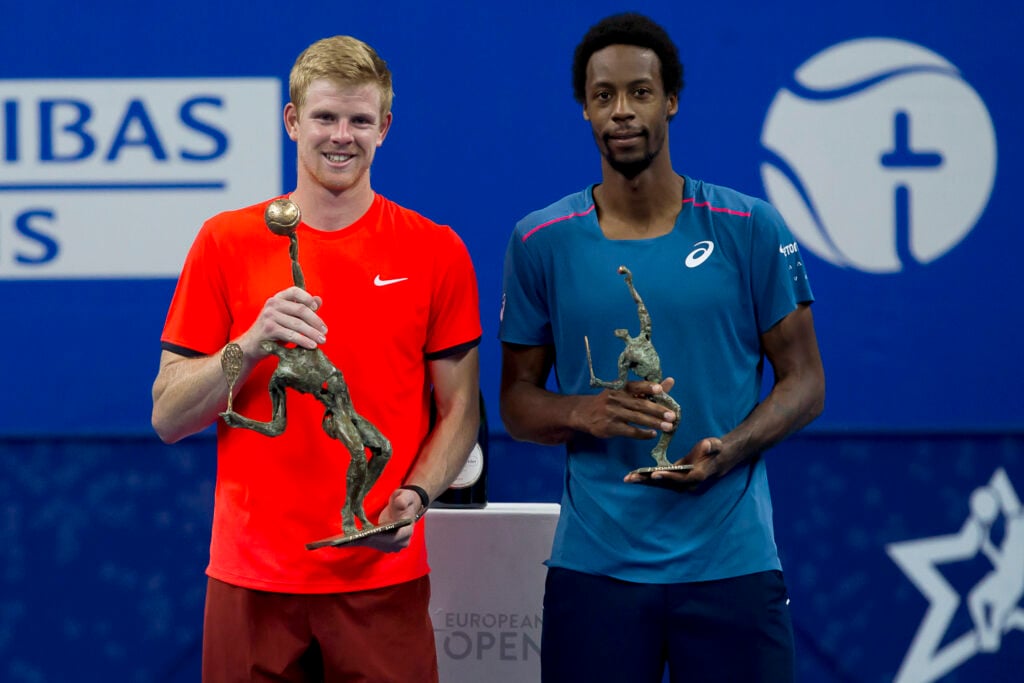Britain's Kyle Edmund holds his trophy after beating France's Gael Monfils in the final of the 'European Open' hard court tennis tournament in Antwerp on October 21, 2018. - British number one Kyle Edmund fought back to down Gael Monfils in a final-set tie-break and claim his maiden ATP Tour title at the European Open in Antwerp. The 3-6, 7-6 (7/2), 7-6 (7/4) victory caps a breakthrough season for the 23-year-old and keeps alive his slim hopes of qualifying for the ATP World Tour Finals in London next month.