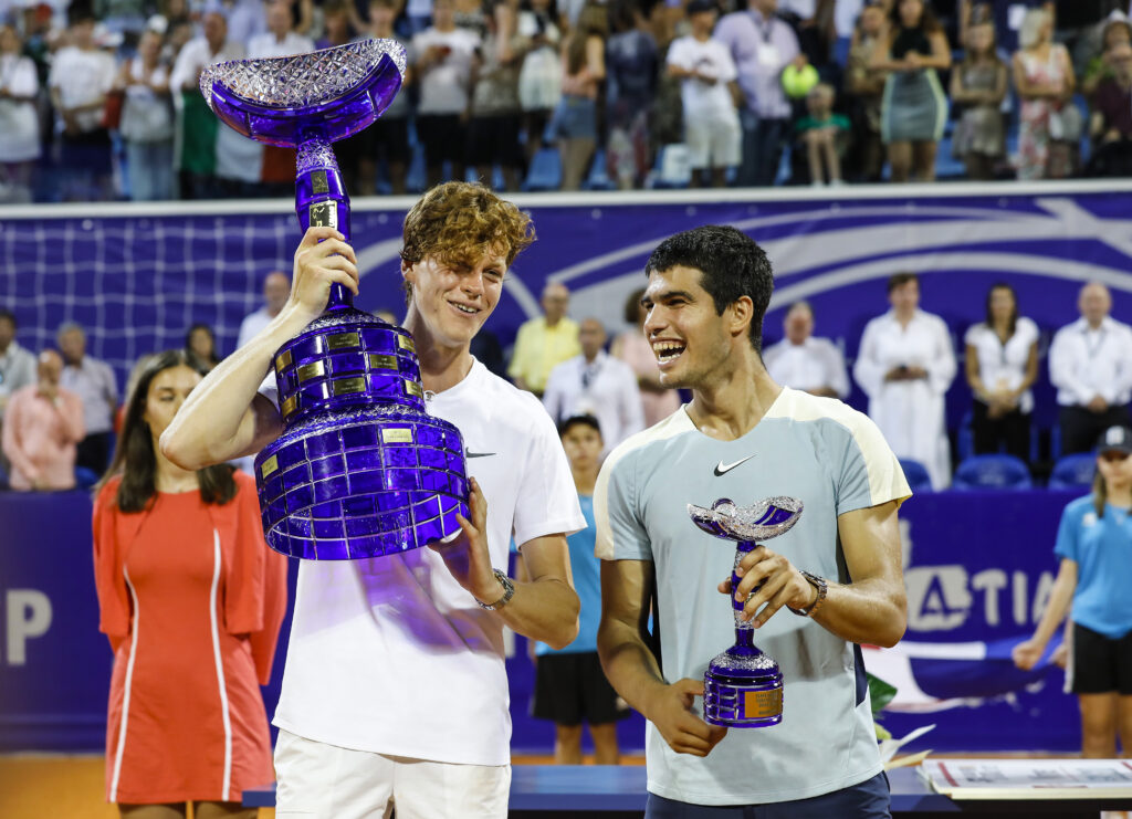 Jannik Sinner of Italy and Carlos Alcaraz of Spain pose with the trophies after the men's singles final match on Day 8 of the 2022 Croatia Open Umag at Goran Ivanisevic ATP Stadium on July 31, 2022 in Umag, Croatia.