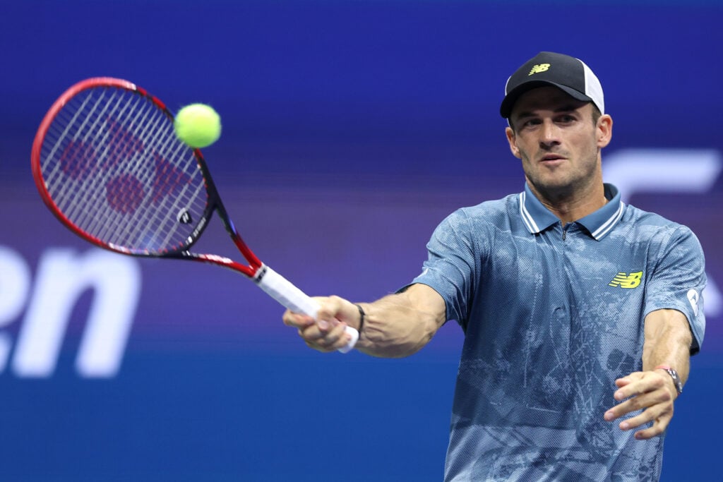 Tommy Paul hits a forehand at the 2024 US Open - Day 8