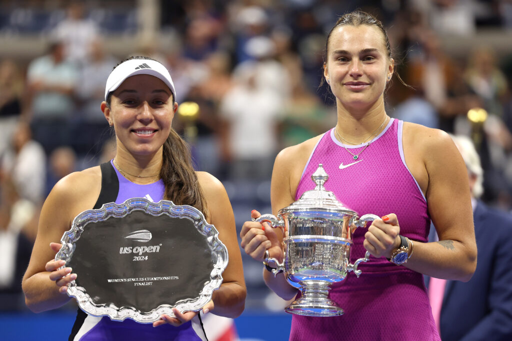 Aryna Sabalenka and Jessica Pegula pose with their trophies