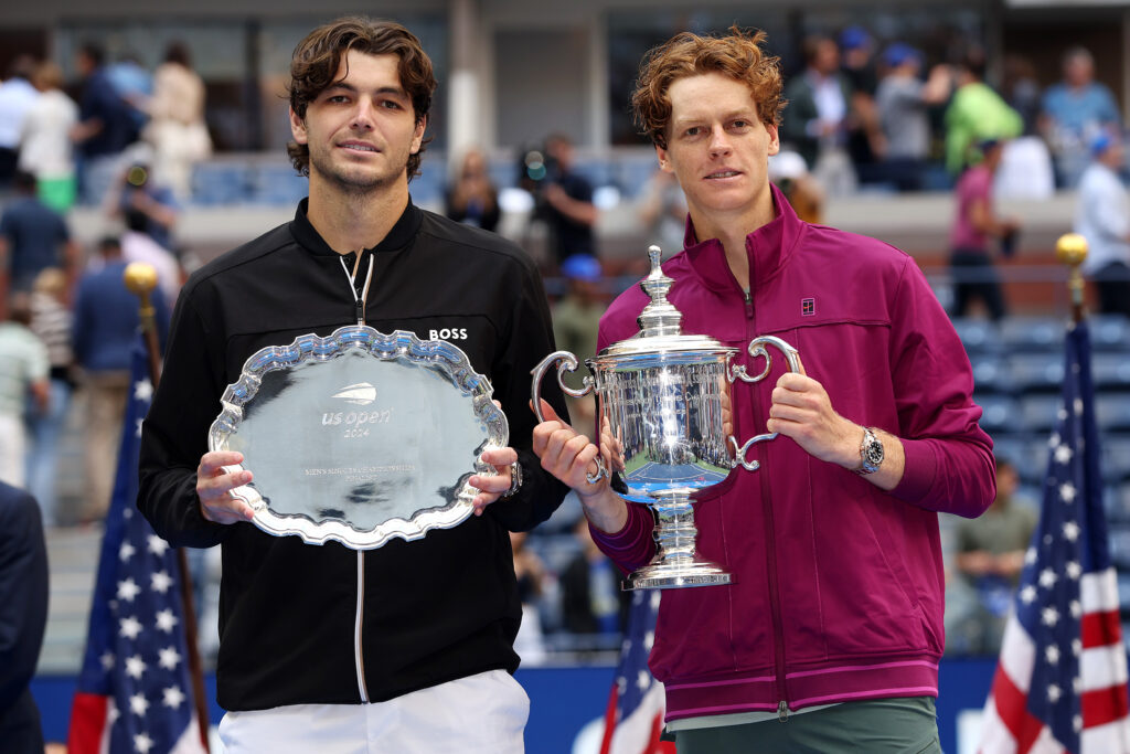 Jannik Sinner (R) of Italy and Taylor Fritz of the United States pose for a photo following Sinner's Men's Singles Final victory on Day Fourteen of the 2024 US Open at USTA Billie Jean King National Tennis Center on September 08, 2024 in the Flushing neighborhood of the Queens borough of New York City.