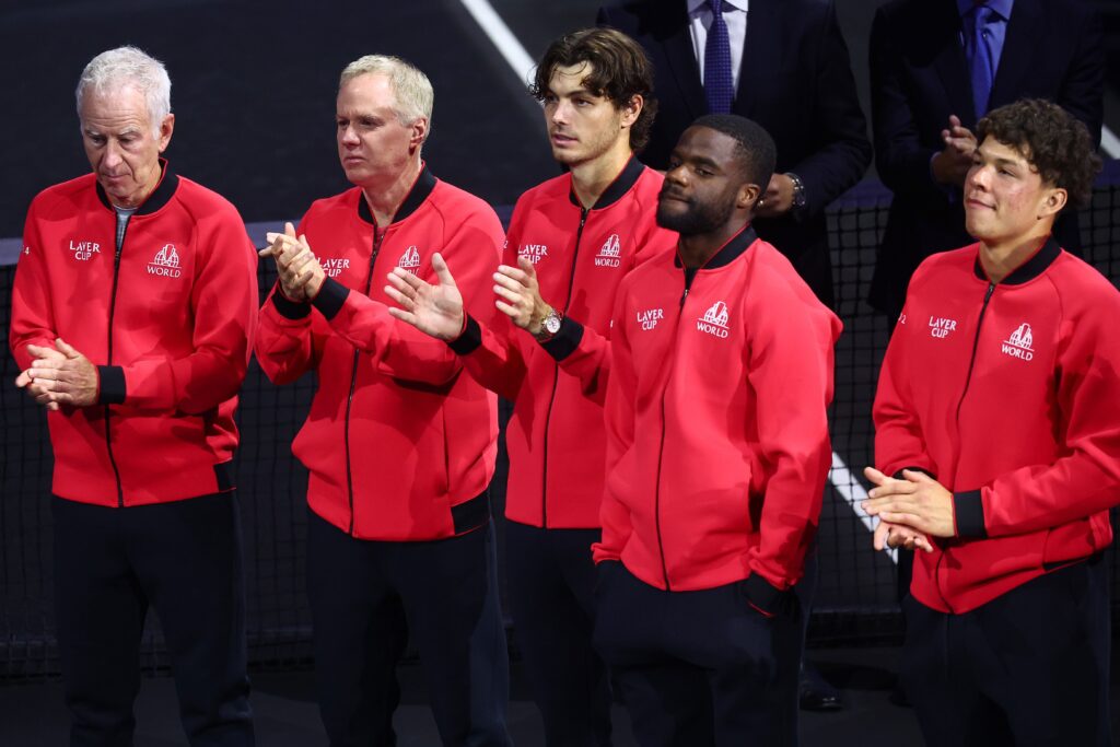 John McEnroe, Captain of Team World, Patrick McEnroe, Vice Captain of Team World, Taylor Fritz, Frances Tiafoe and Ben Shelton of Team World applaud