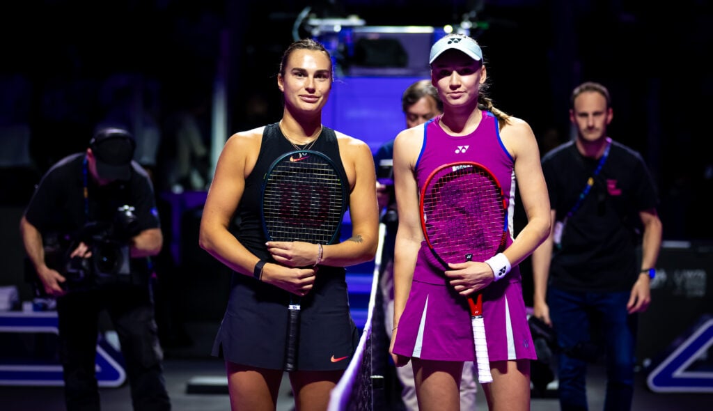 Aryna Sabalenka and Elena Rybakina take photos before their match at the WTA Finals 2024 - Day 5