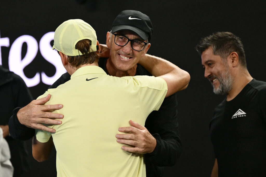 Jannik Sinner of Italy celebrates winning with his coach Darren Cahill after winning in the Men's Singles Final against Alexander Zverev of Germany during day 15 of the 2025 Australian Open at Melbourne Park on January 26, 2025 in Melbourne, Australia.