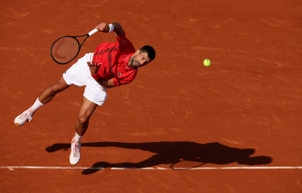 Novak Djokovic of Serbia serves against Cameron Norrie of Great Britain during the Men's Singles Fourth Round match on Day Nine of the 2025 French Open at Roland Garros on June 02, 2025 in Paris, France.