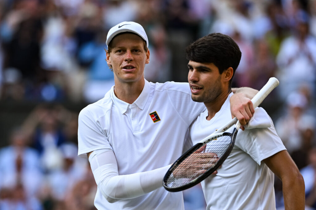 Jannik Sinner of Italy and Carlos Alcaraz of Spain after the Men's Singles Final on day fourteen of The Championships Wimbledon 2025 at All England Lawn Tennis and Croquet Club on July 13, 2025 in London, England.