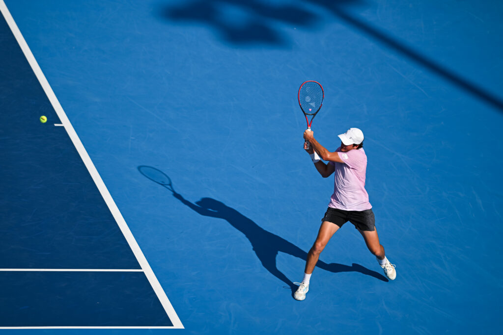 Joao Fonseca hits a backhand
