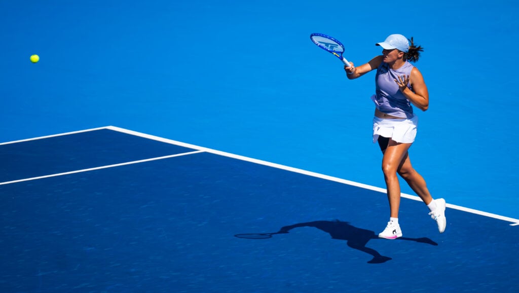 Iga Swiatek hits a forehand
