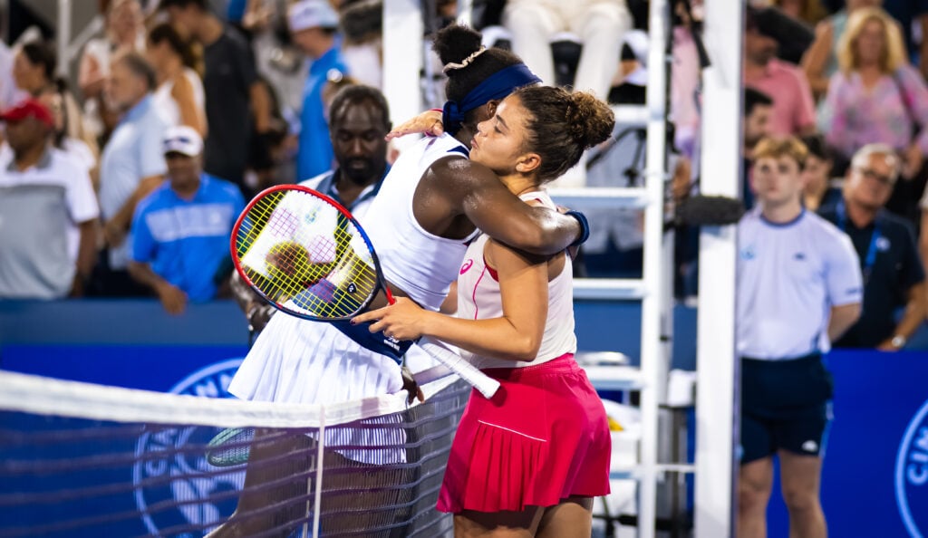 Jasmine Paolini of Italy and Coco Gauff of the United States embrace at the net after the quarter-final on Day 9 of the Cincinnati Open at Lindner Family Tennis Center on August 15, 2025 in Mason, Ohio