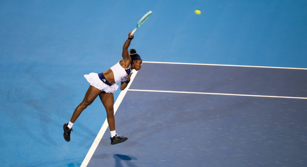 Coco Gauff serves
