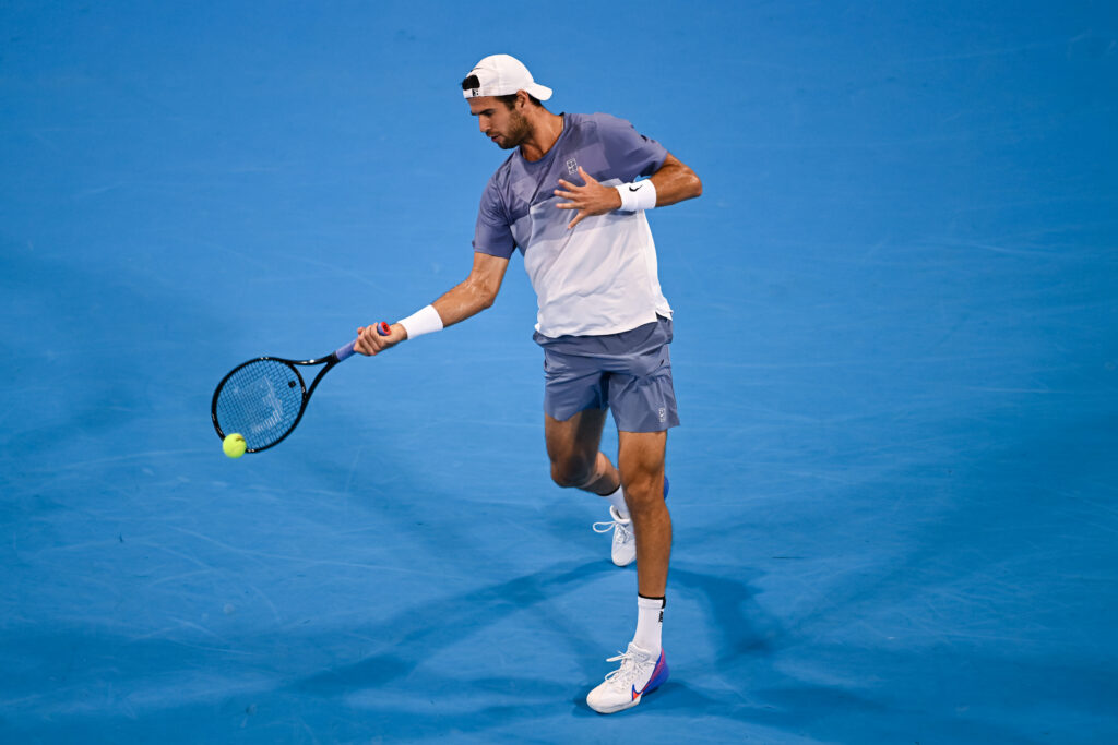 Karen Khachanov hits a forehand