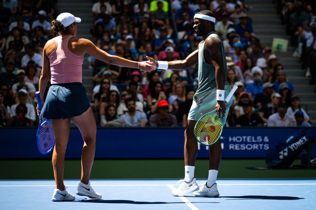 Madison Keys high fives Frances Tiafoe