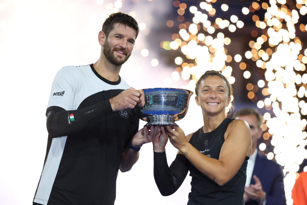 Andrea Vavassori and Sara Errani hold the US Open mixed doubles trophy