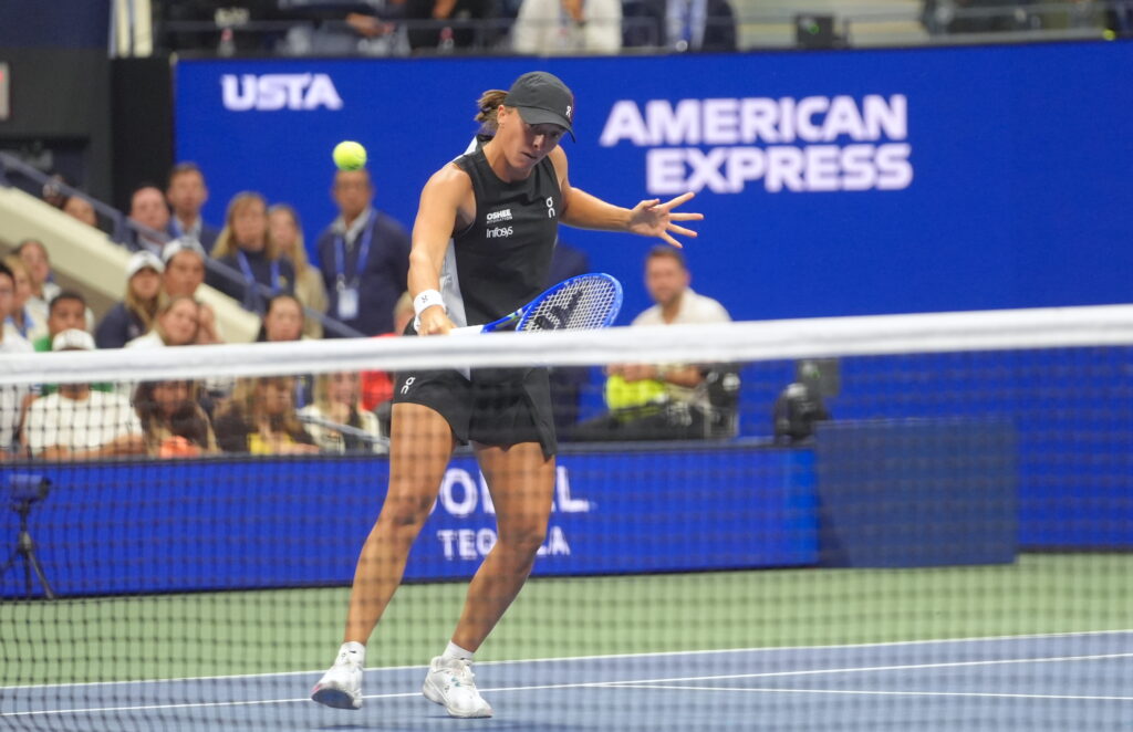 Iga Swiatek hits a volley during the 2025 US Open Mixed Doubles Final