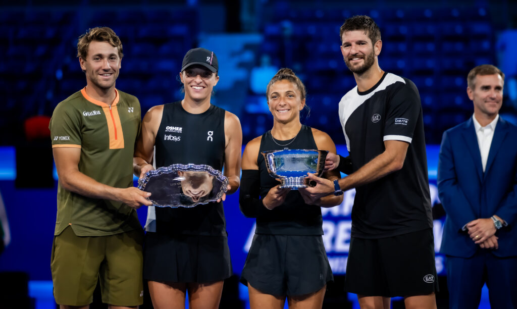 The 2025 US Open - Mixed Doubles finalists pose with the winners and runners-up trophies