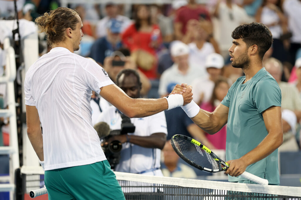 Alexander Zverev of Germany congratulates Carlos Alcaraz of Spain after their match during the semifinals of the Cincinnati Open at Lindner Family Tennis Center on August 16, 2025 in Mason, Ohio.