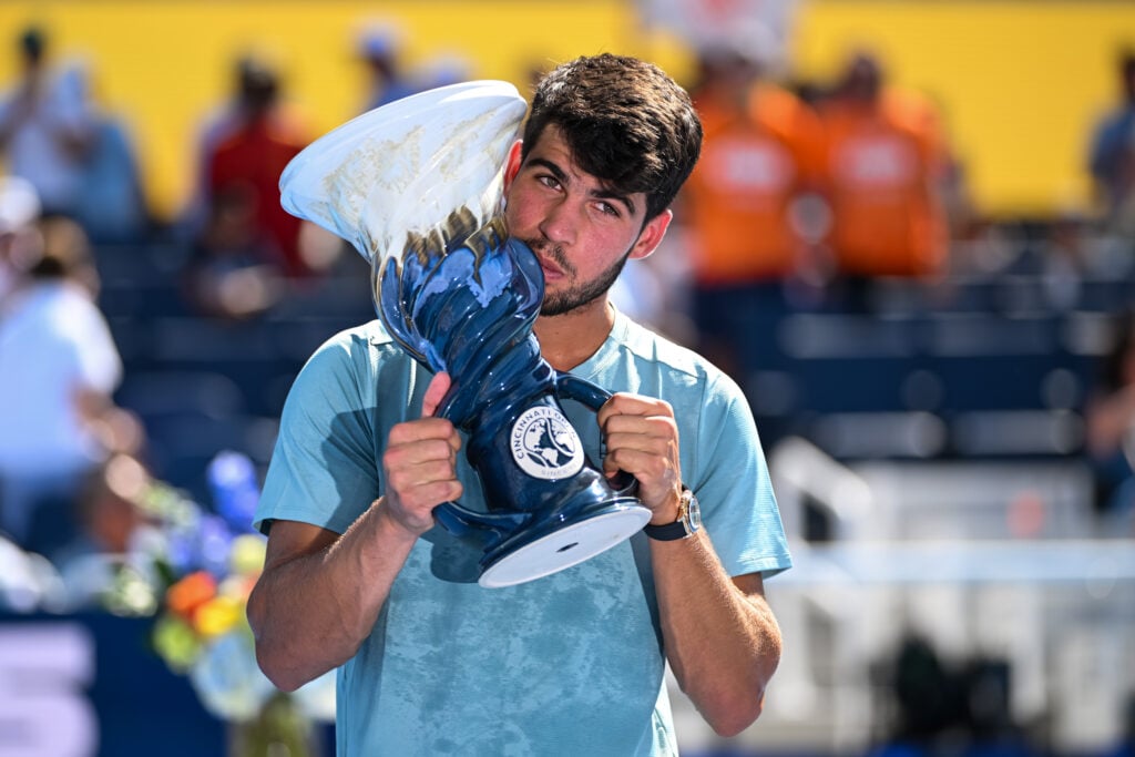 Carlos Alcaraz of Spain poses with the trophy after the Men's Singles Final match against Jannik Sinner of Italy on day twelve of the Cincinnati Open 2025at Lindner Family Tennis Center on August 18, 2025 in Mason, Ohio.