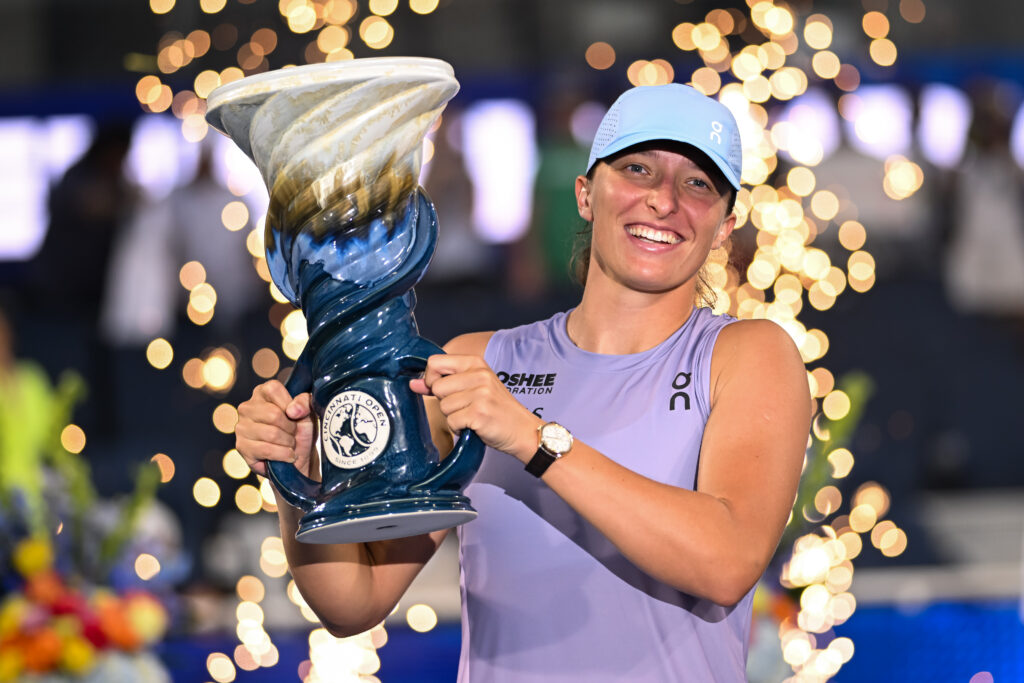 Iga Swiatek of Poland poses with the trophy after the Women's Singles Final match against Jasmine Paolini of Italy on day twelve of the Cincinnati Open 2025 at Lindner Family Tennis Center on August 18, 2025 in Mason, Ohio.
