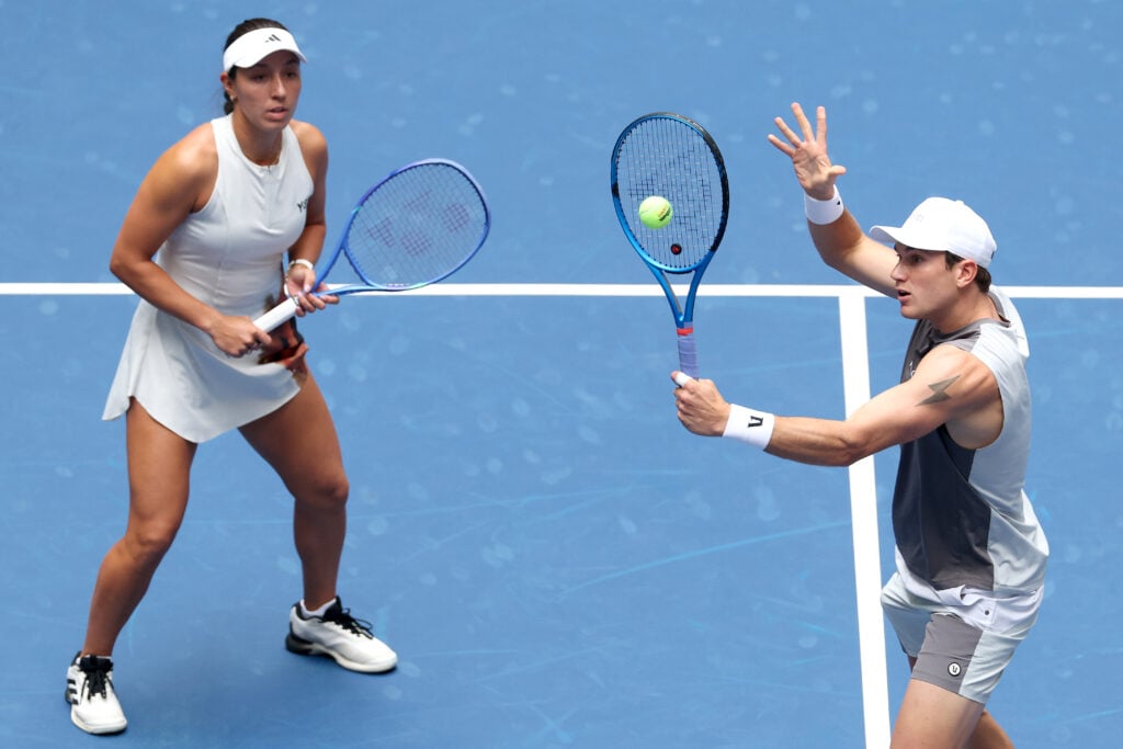 Jack Draper hits a volley alongside Jessica Pegula at the 2025 US Open - Mixed Doubles