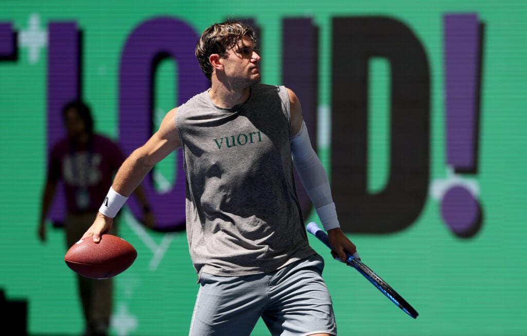 Jack Draper of Great Britain throws an American football into the crowd during Arthur Ashe Kids' Day at USTA Billie Jean King National Tennis Center on August 23, 2025 in New York City.