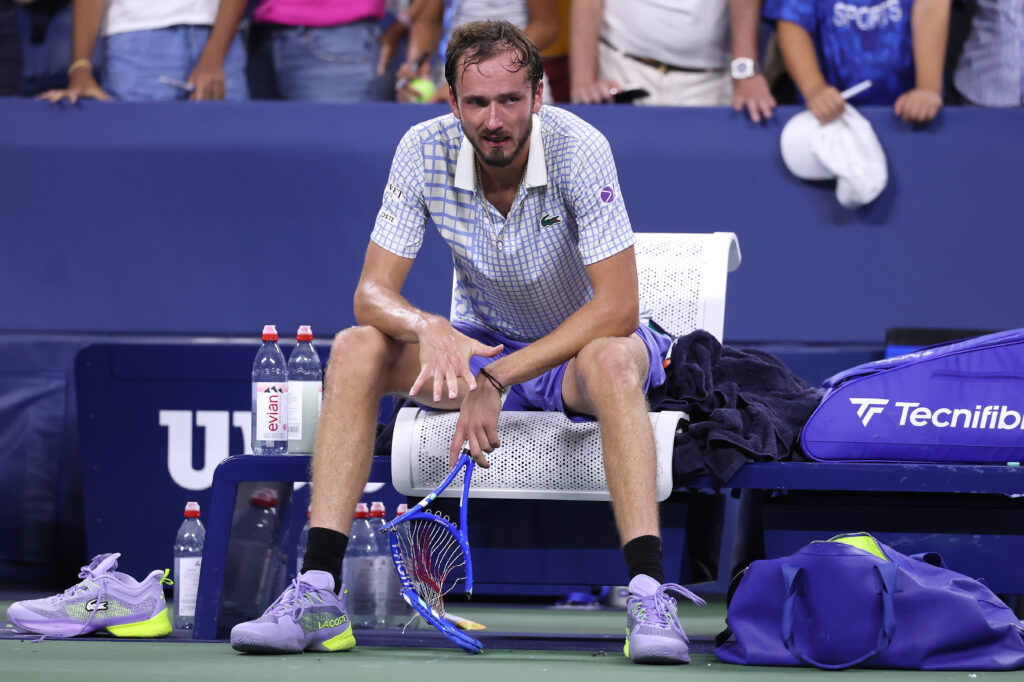 Daniil Medvedev breaks his racket after losing in five sets to Benjamin Bonzi of France during their Men's Singles First Round match on Day One of the 2025 US Open at USTA Billie Jean King National Tennis Center on August 24, 2025 in the Flushing neighborhood of the Queens borough of New York City.