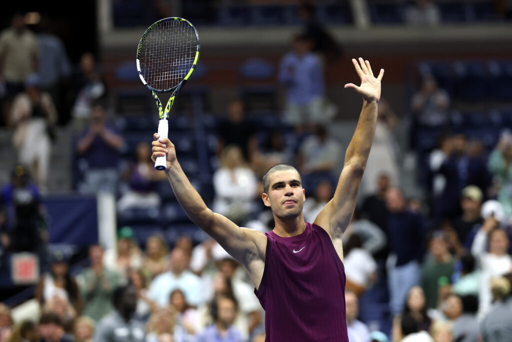 Carlos Alcaraz of Spain celebrates after defeating Reilly Opelka of the United States during their Men's Singles First Round match on Day Two of the 2025 US Open