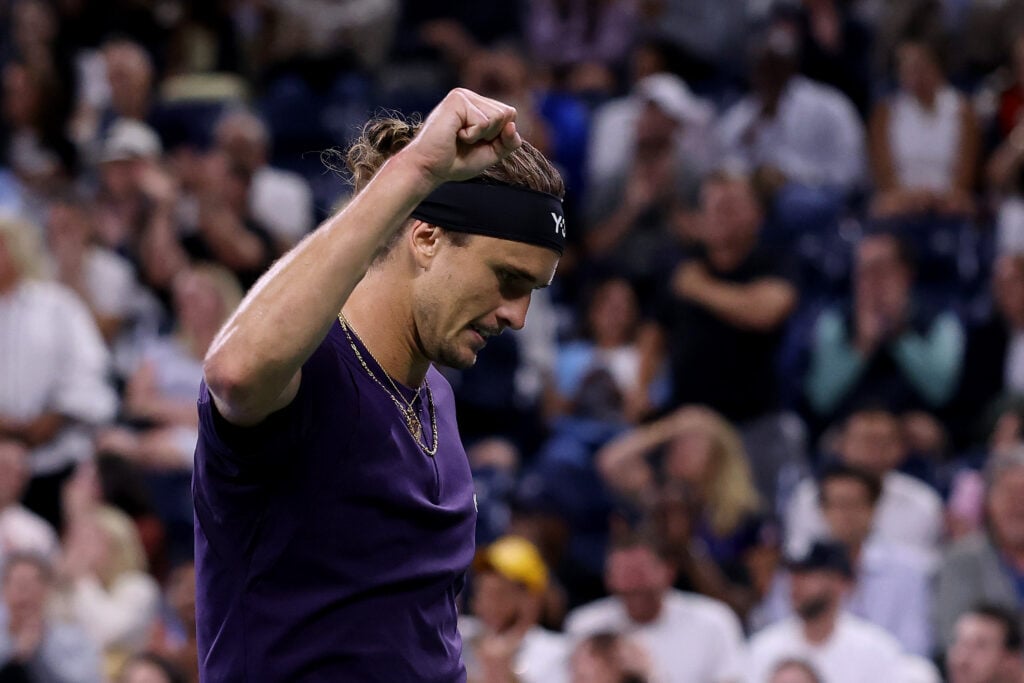 Alexander Zverev lifts his arm in celebration