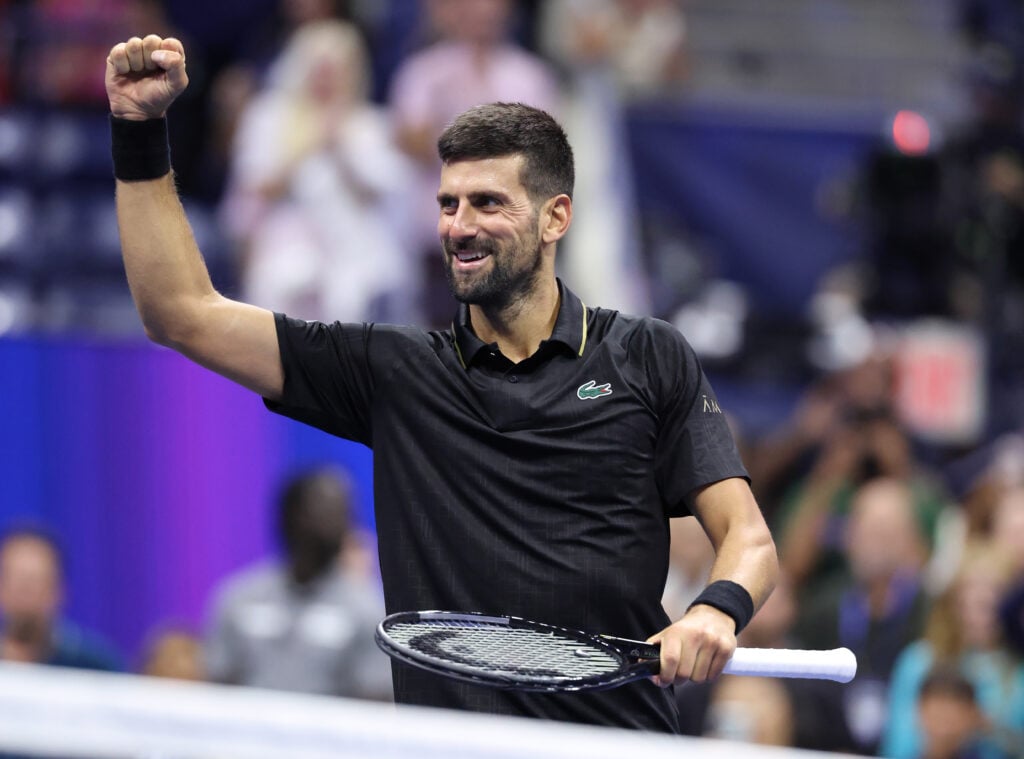 Novak Djokovic raises his fist
