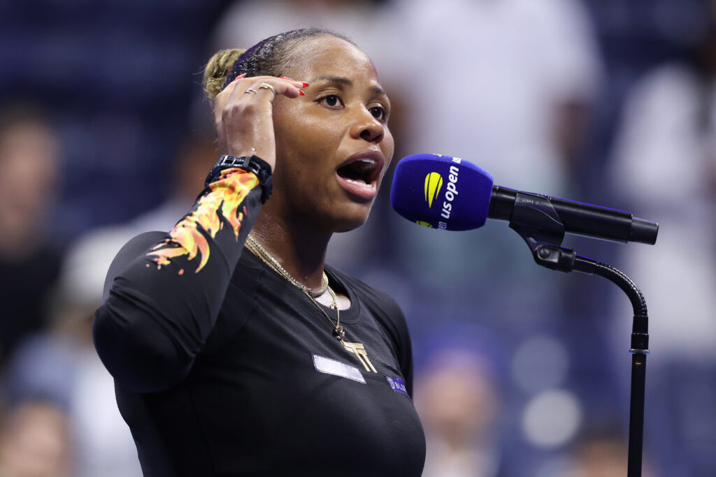 Taylor Townsend speaks into a microphone