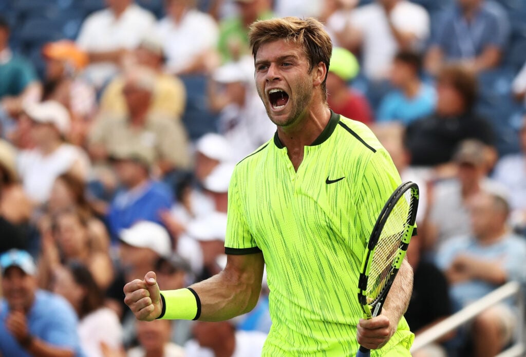 Ryan Harrison of the United States celebrates his win over Milos Raonic of Canada during his second round Men's Singles match on Day Three of the 2016 US Open at the USTA Billie Jean King National Tennis Center on August 31, 2016 in the Flushing neighborhood of the Queens borough of New York City.