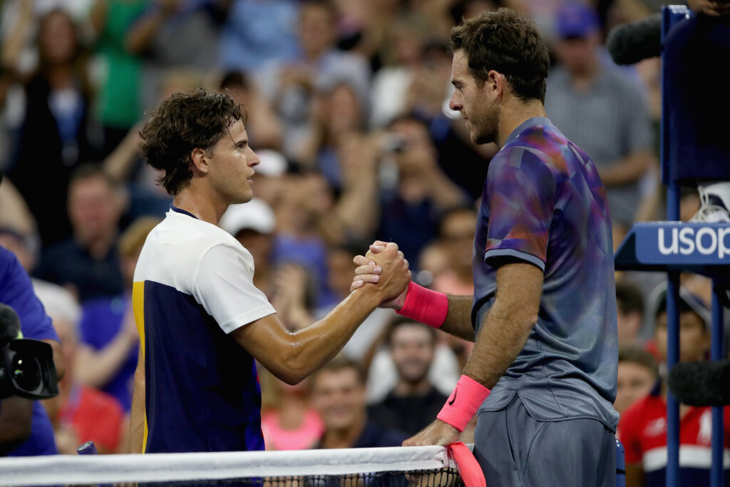 Juan Martin del Potro of Argentina shakes hands with Dominic Thiem of Austria after defeating him in their fourth round Men's Singles match on Day Eight of the 2017 US Open